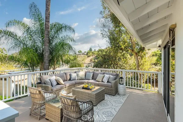 a kitchen with stainless steel appliances a stove a sink a refrigerator and cabinets