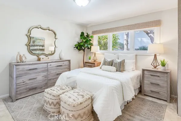 a view of backyard with seating area and trees
