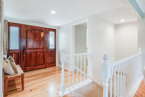 a living room with furniture a dining table with wooden floor