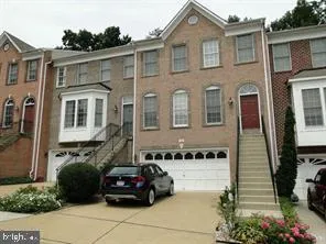 a car parked in front of a house