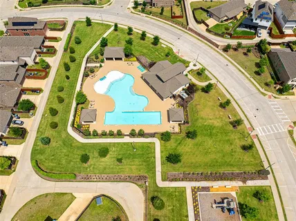 an aerial view of a swimming pool