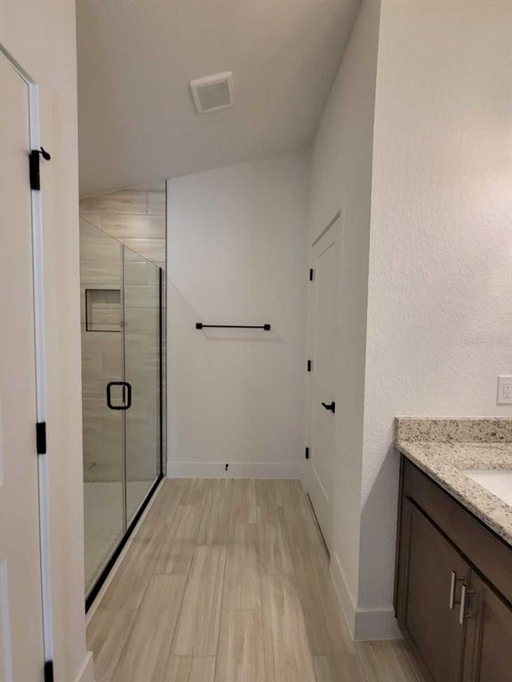 4513 Southwest 91st Ln Road Ocala, FL 34476 - Photo 14 of 36 a view of bathroom with a sink and shower