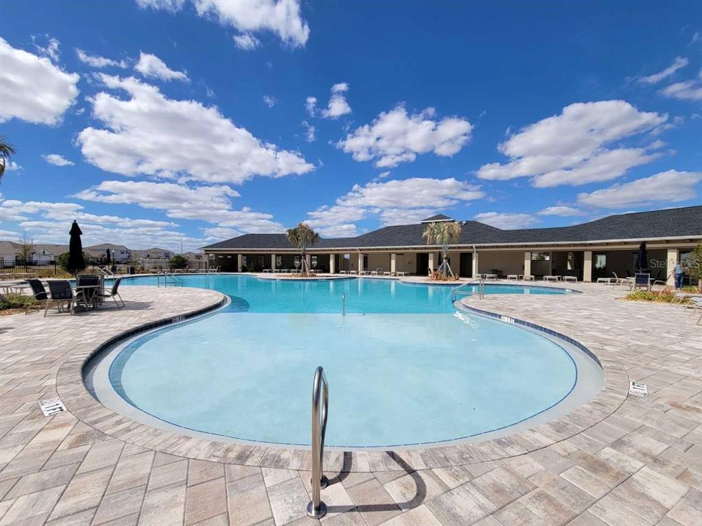 4513 Southwest 91st Ln Road Ocala, FL 34476 - Photo 24 of 36 a view of a house with a swimming pool
