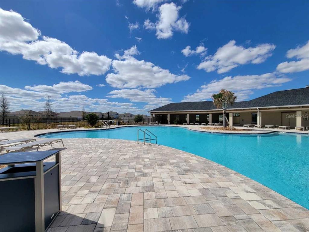 4513 Southwest 91st Ln Road Ocala, FL 34476 - Photo 26 of 36 a view of house with yard