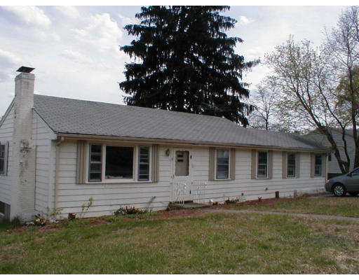 38 Bird Road Norwood, MA 02062 - Photo 1 of 1 a front view of a house with a garden