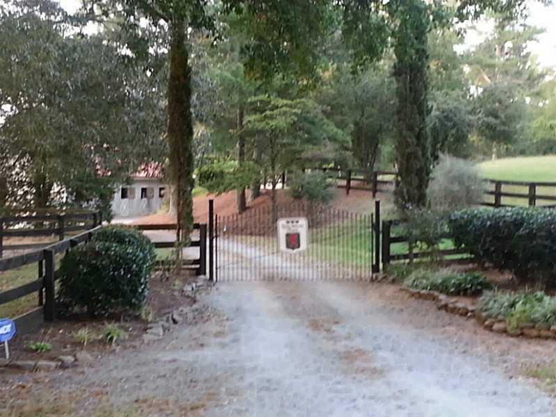 13355 Arnold Mill Road Roswell, GA 30075 - Photo 1 of 1 Exterior Front. Entry into Lion Heart Farm