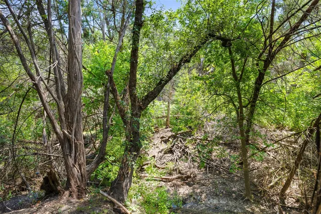 an aerial view of residential house with parking space