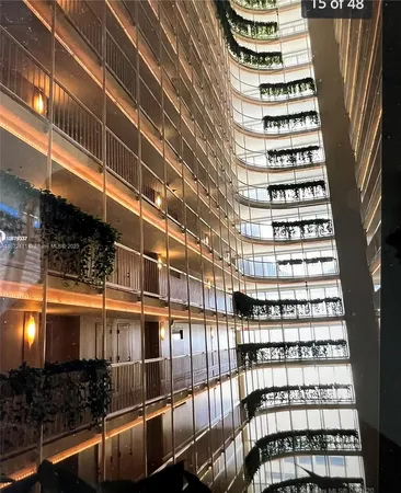 a bathroom with a granite countertop sink a shower and a mirror