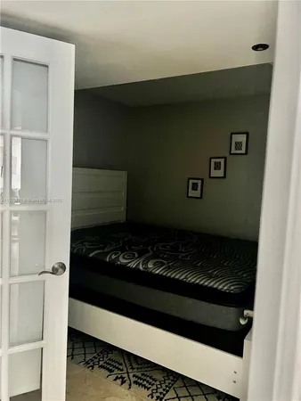 a kitchen with a stove and a refrigerator