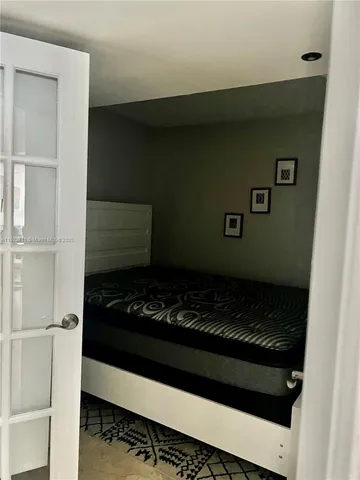 a kitchen with a stove and a refrigerator