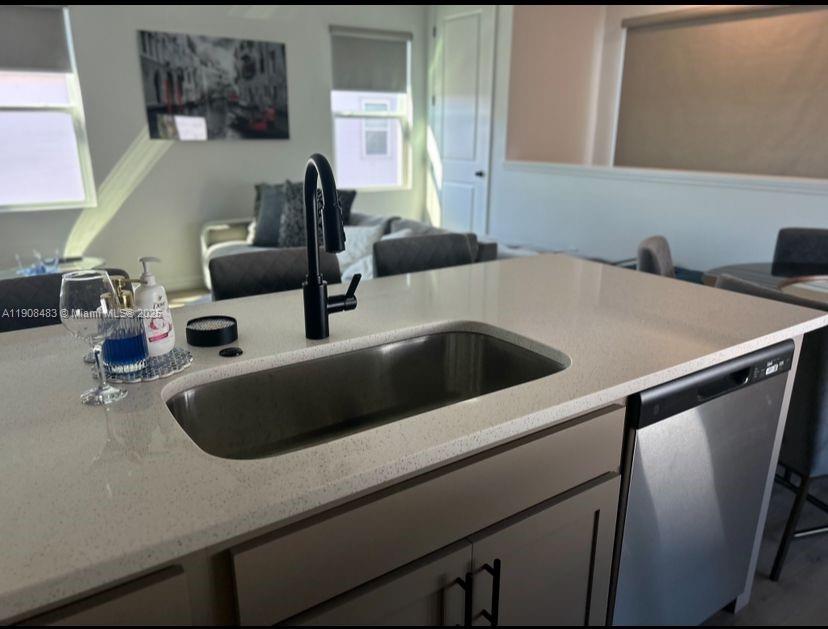 2952 Embark Trail, Unit D134 St. Cloud, FL 34771 - Photo 6 of 12 a close view of sink and tap