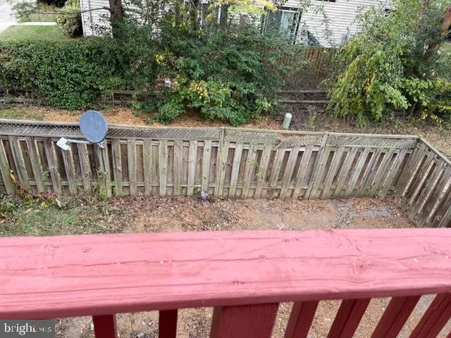 a view of a wooden fence