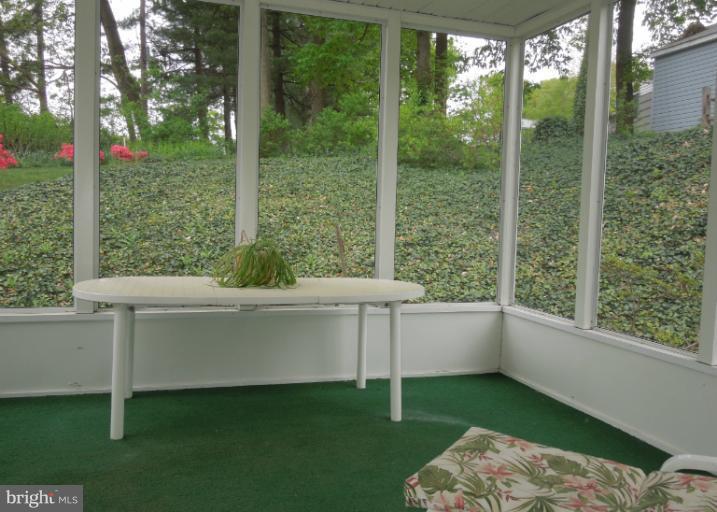 119 Charmuth Road Lutherville-Timonium, MD 21093 - Photo 1 of 14 Screened Porch off of Dining Room