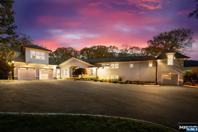 a view of a town with large trees