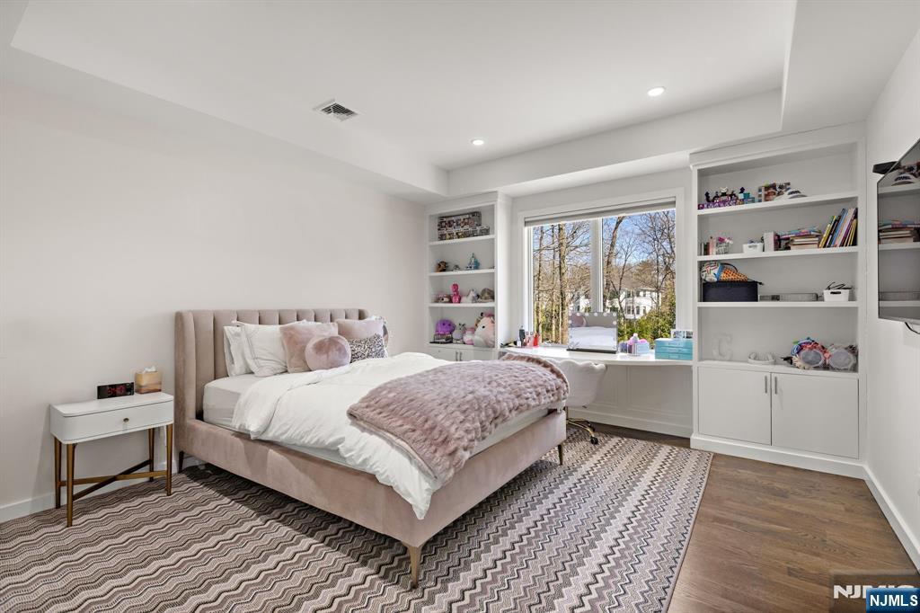 425 Highview Road Englewood, NJ 07631 - Photo 19 of 48 a bedroom with a bed and a window