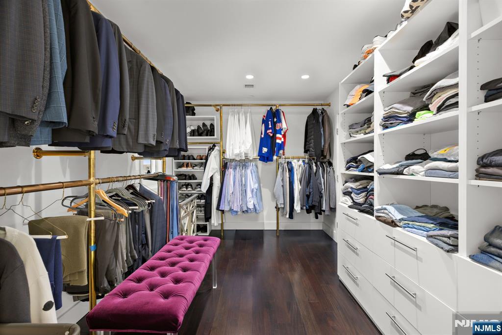 425 Highview Road Englewood, NJ 07631 - Photo 26 of 48 a view of walk in closet with clothes and shoes