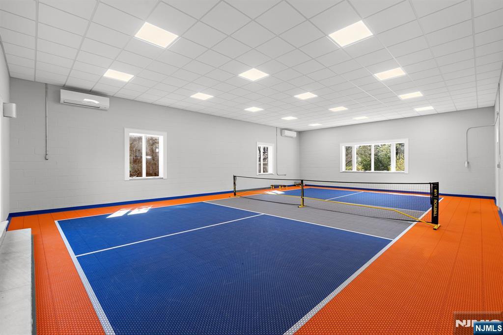 425 Highview Road Englewood, NJ 07631 - Photo 29 of 48 a room with wooden floor and pool table