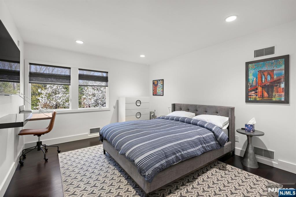 425 Highview Road Englewood, NJ 07631 - Photo 32 of 48 a bedroom with a bed and a window