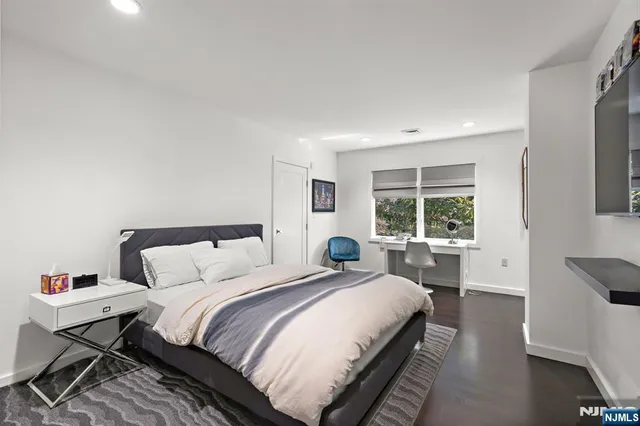 a view of a chairs and table in patio
