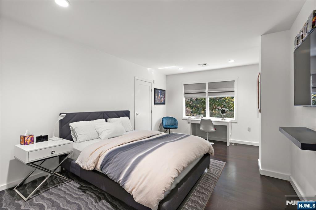 425 Highview Road Englewood, NJ 07631 - Photo 33 of 48 a bedroom with a bed and a large window