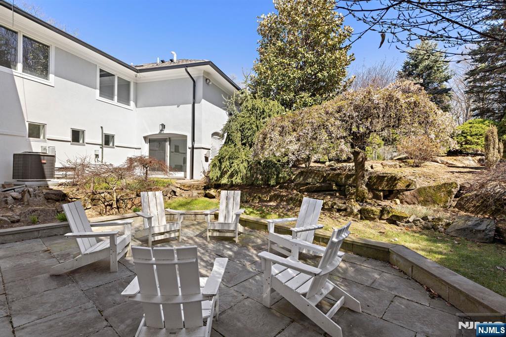 425 Highview Road Englewood, NJ 07631 - Photo 35 of 48 a view of a chairs and table in patio