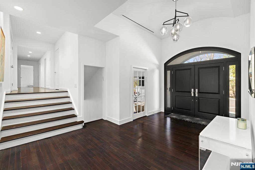 425 Highview Road Englewood, NJ 07631 - Photo 5 of 48 a view of a hallway with wooden floor and staircase