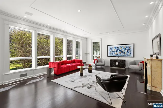 a view of a dining room with furniture and window