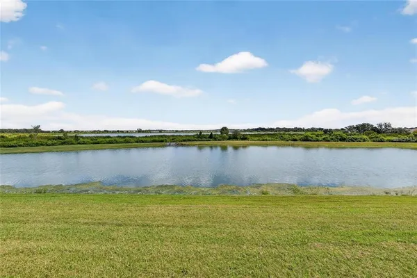 a view of a lake and a houses with lake view