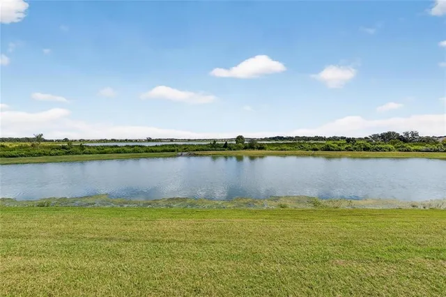 a view of a lake and a houses with lake view