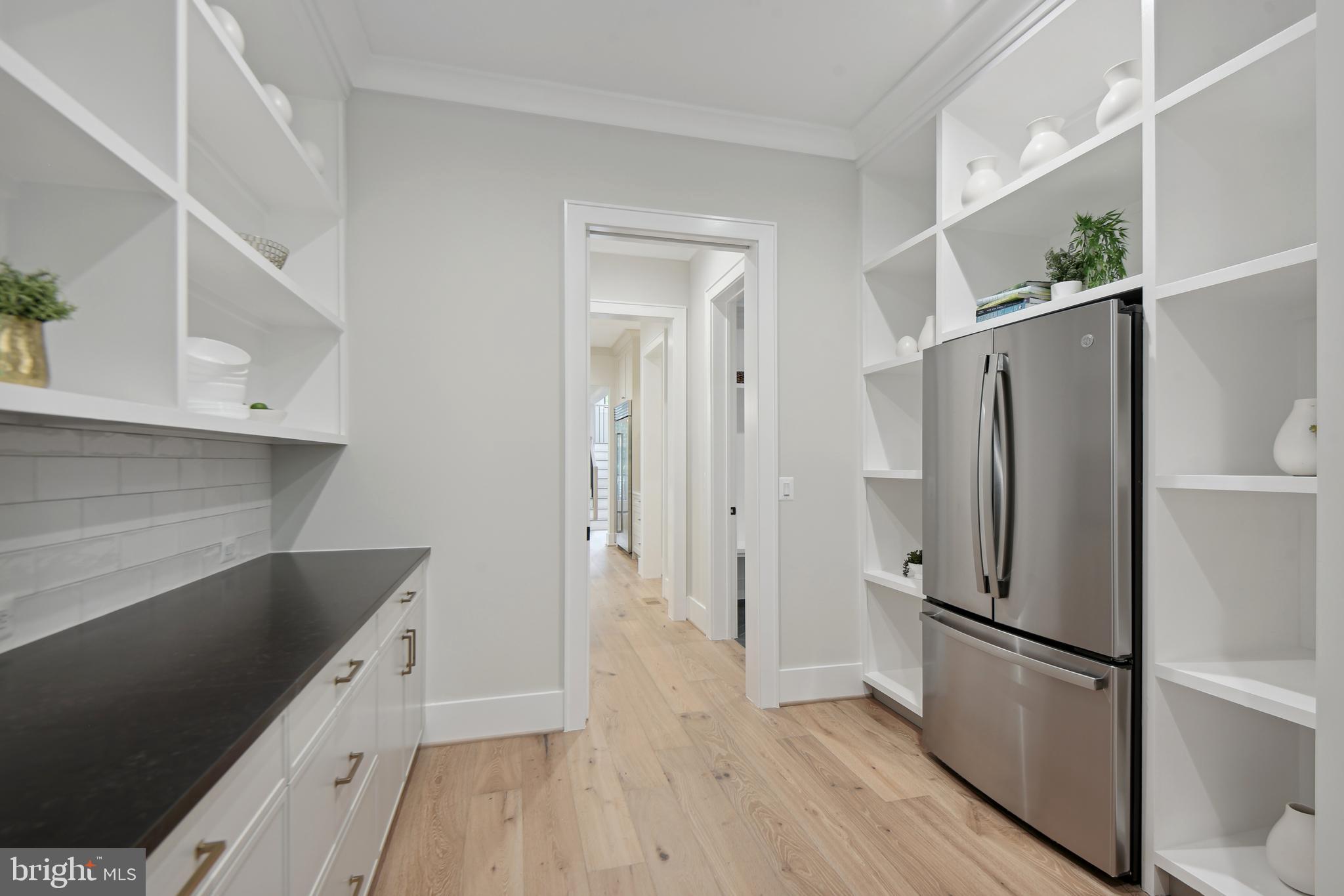 6523 Old Chesterbrook Road McLean, VA 22101 - Photo 8 of 17 a kitchen with a refrigerator a sink and dishwasher