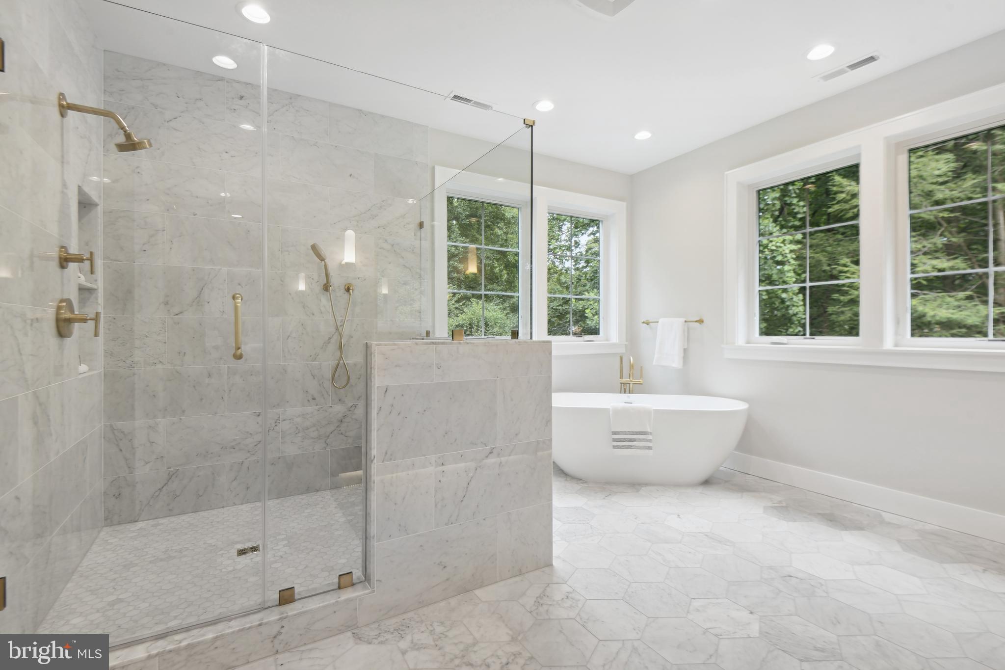 6523 Old Chesterbrook Road McLean, VA 22101 - Photo 12 of 17 a bathroom with a bathtub and shower