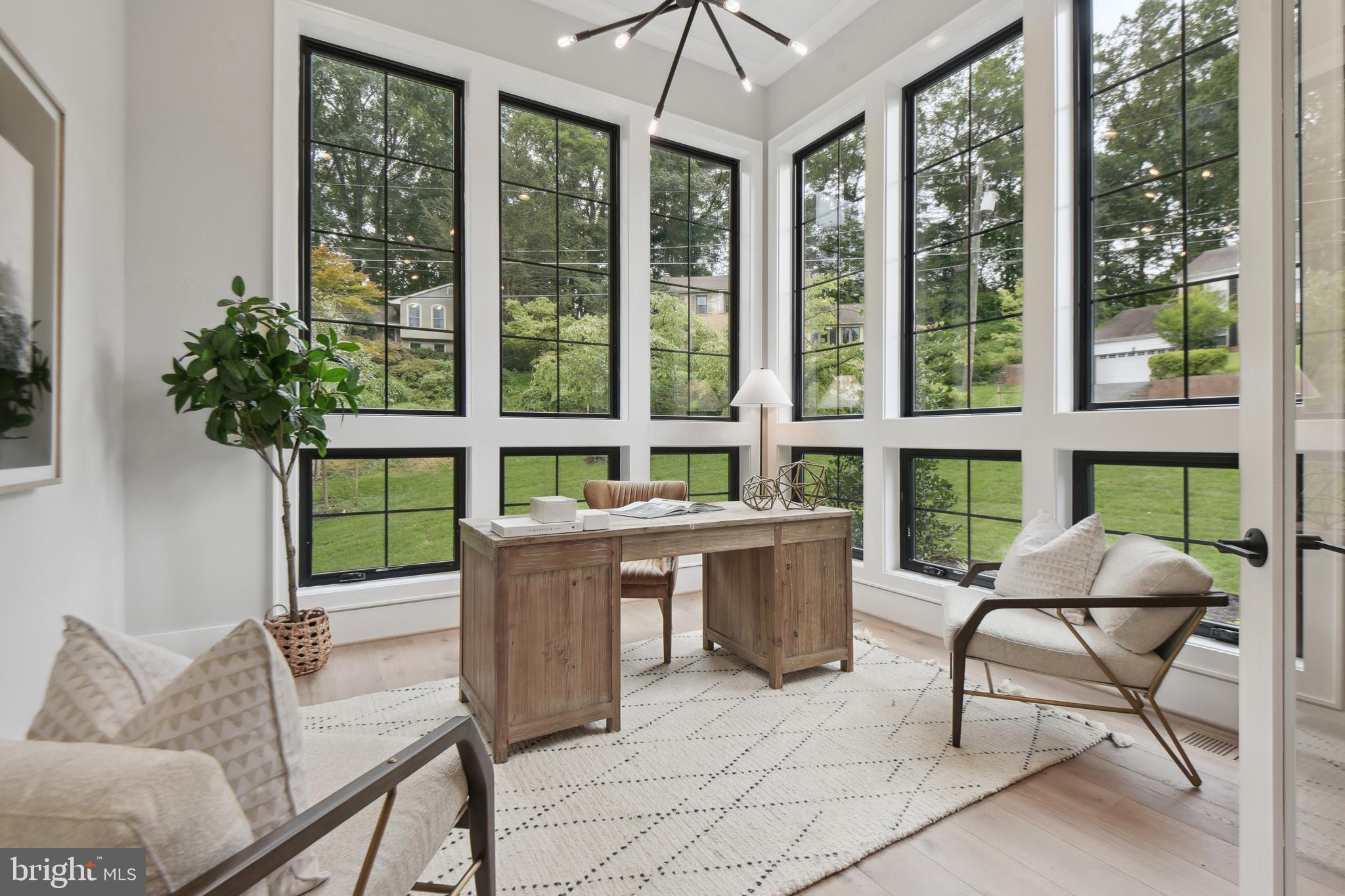 6523 Old Chesterbrook Road McLean, VA 22101 - Photo 13 of 17 a living room with furniture and a large window