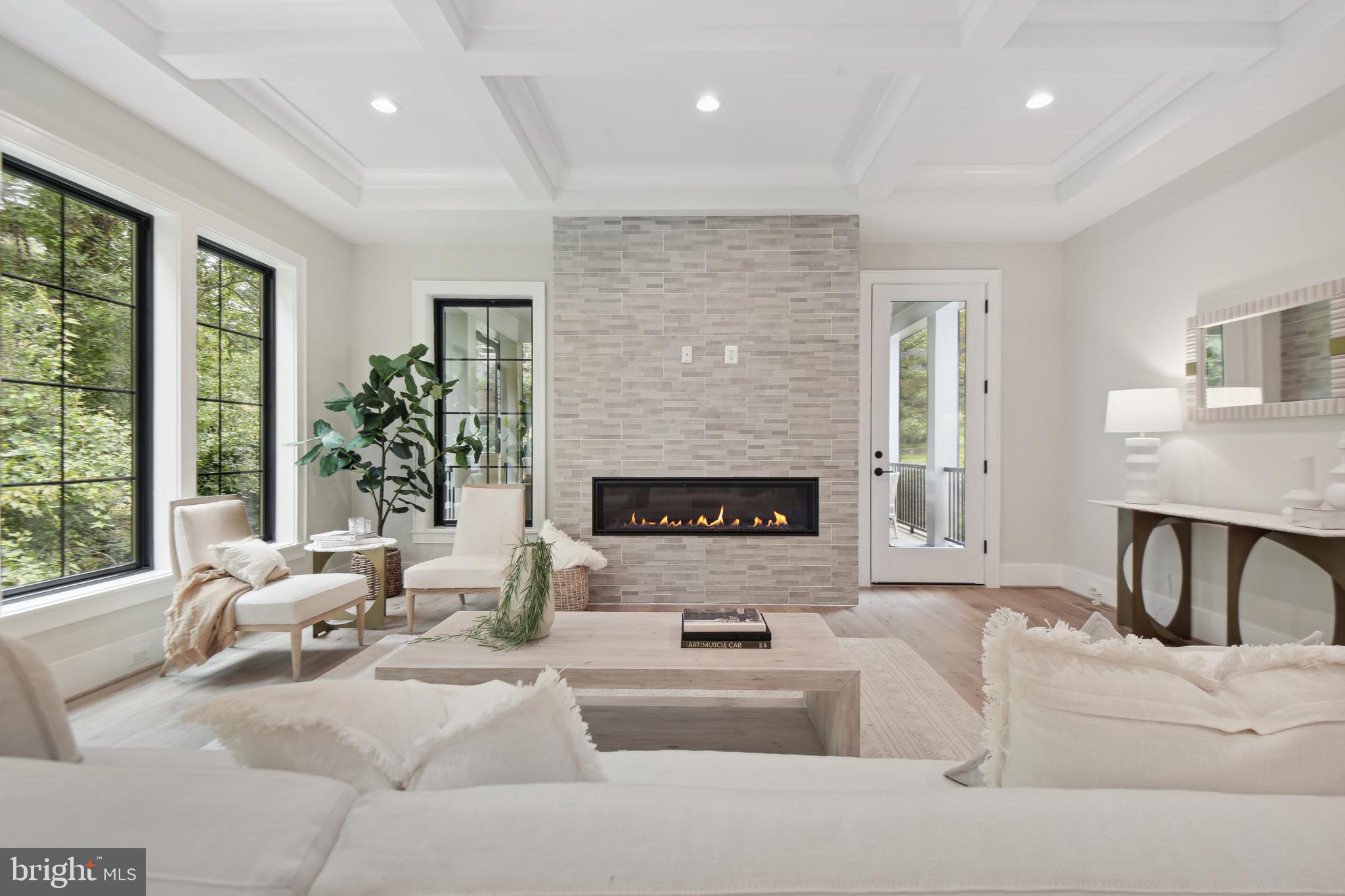 6523 Old Chesterbrook Road McLean, VA 22101 - Photo 2 of 17 a living room with furniture and a fireplace