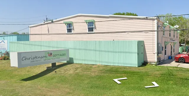 a view of a backyard with a garden
