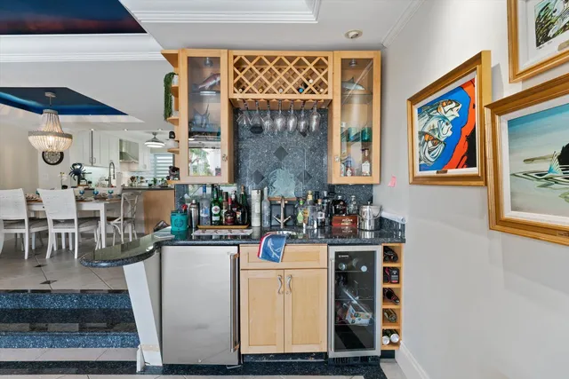 a room with lots of counter space and painting on the wall