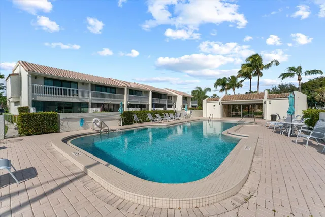 a view of a house with swimming pool