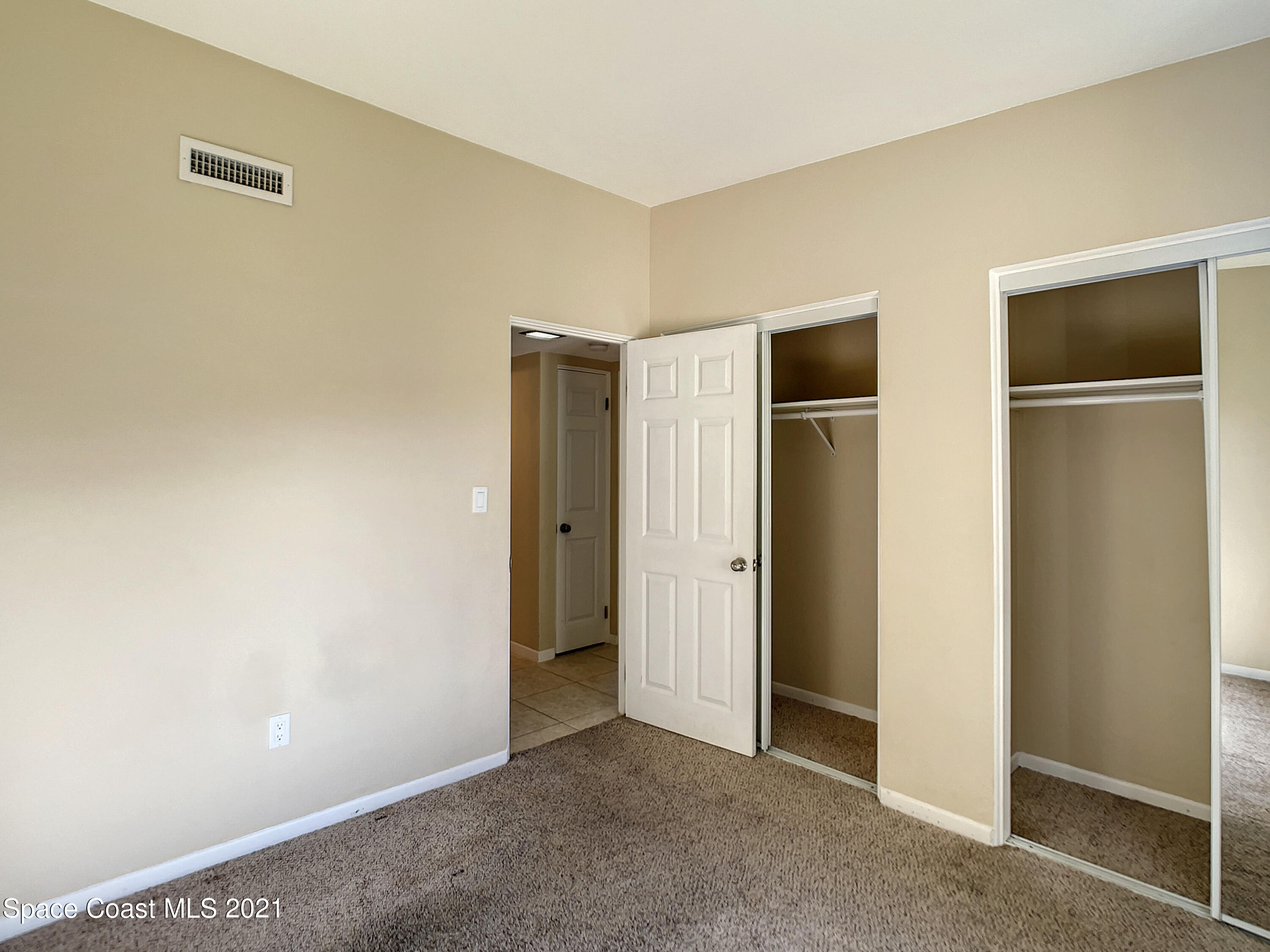 946 Santa Cruz Road Cocoa Beach, FL 32931 - Photo 12 of 26 a view of an empty room