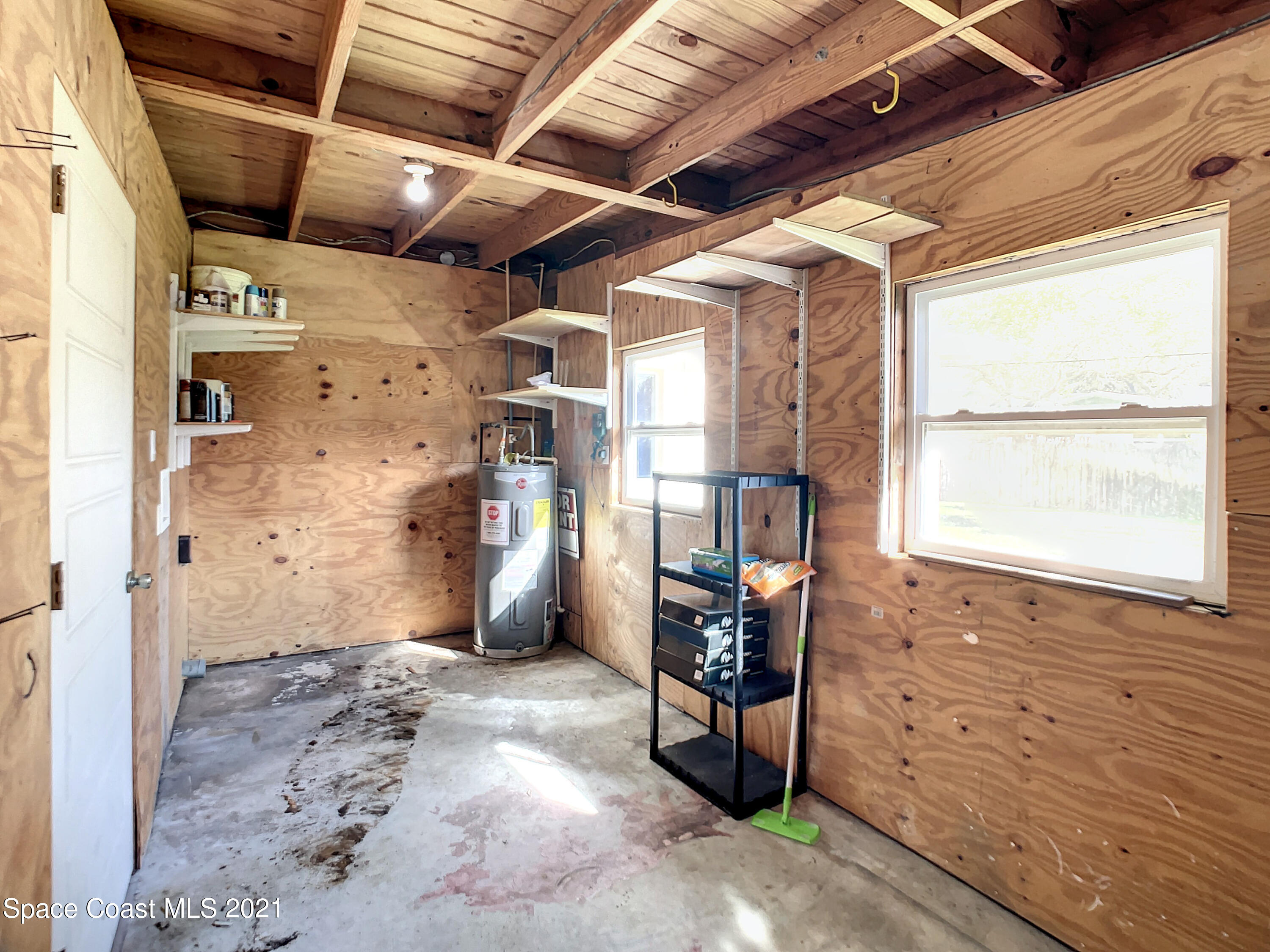 946 Santa Cruz Road Cocoa Beach, FL 32931 - Photo 21 of 26 a view of a storage & utility room