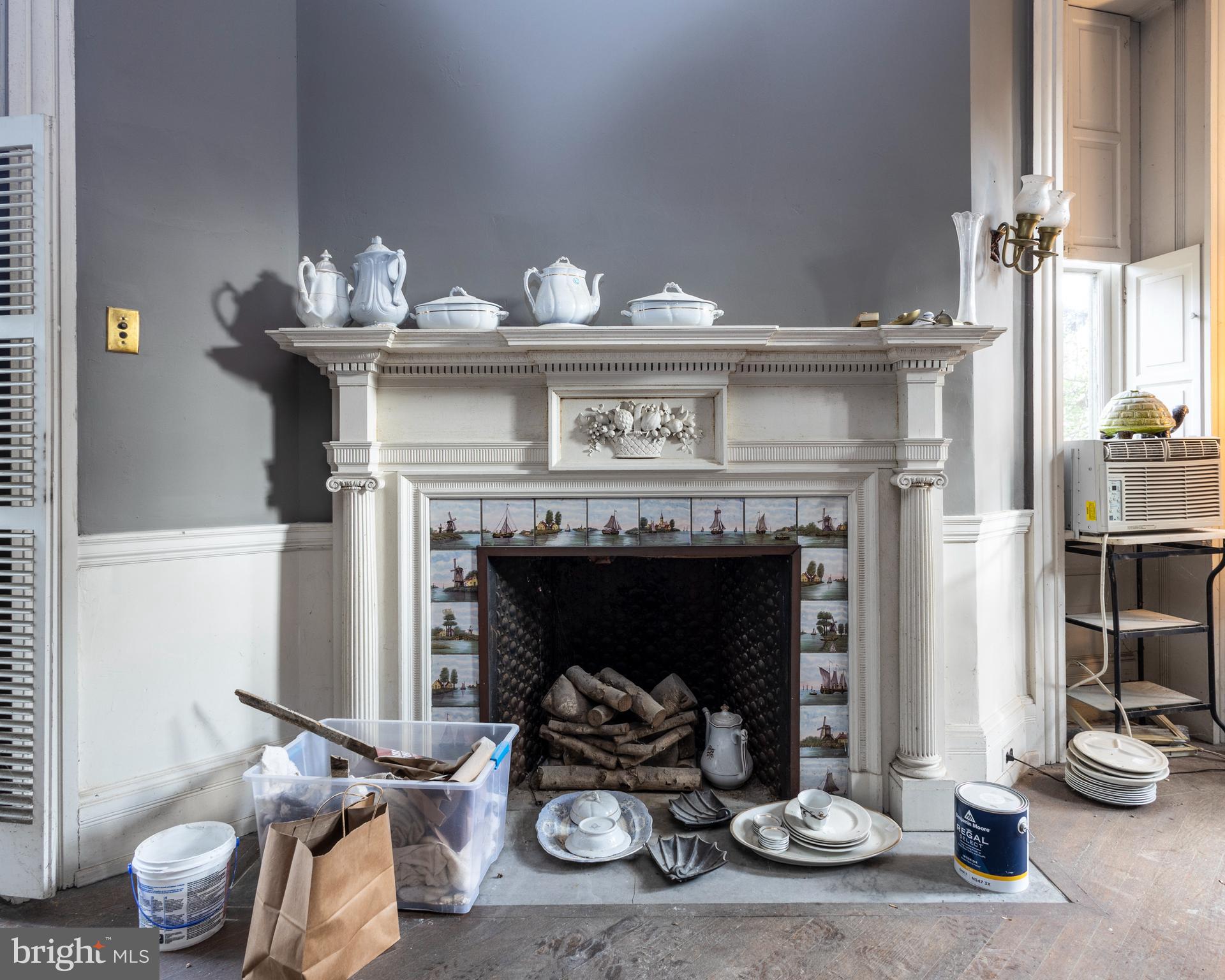 8221 Seminole Street Philadelphia, PA 19118 - Photo 11 of 20 a living room with furniture and a fireplace