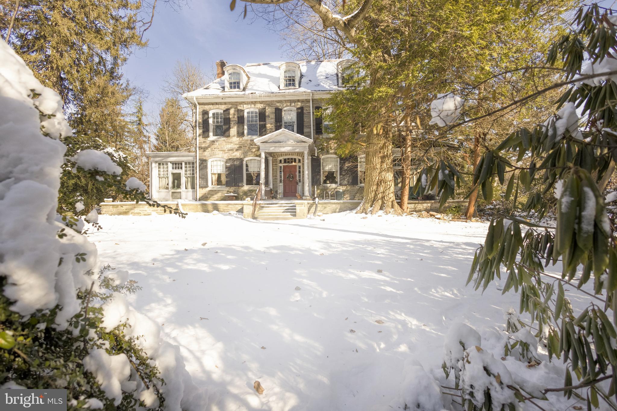 8221 Seminole Street Philadelphia, PA 19118 - Photo 19 of 20 a view of a building with a snow