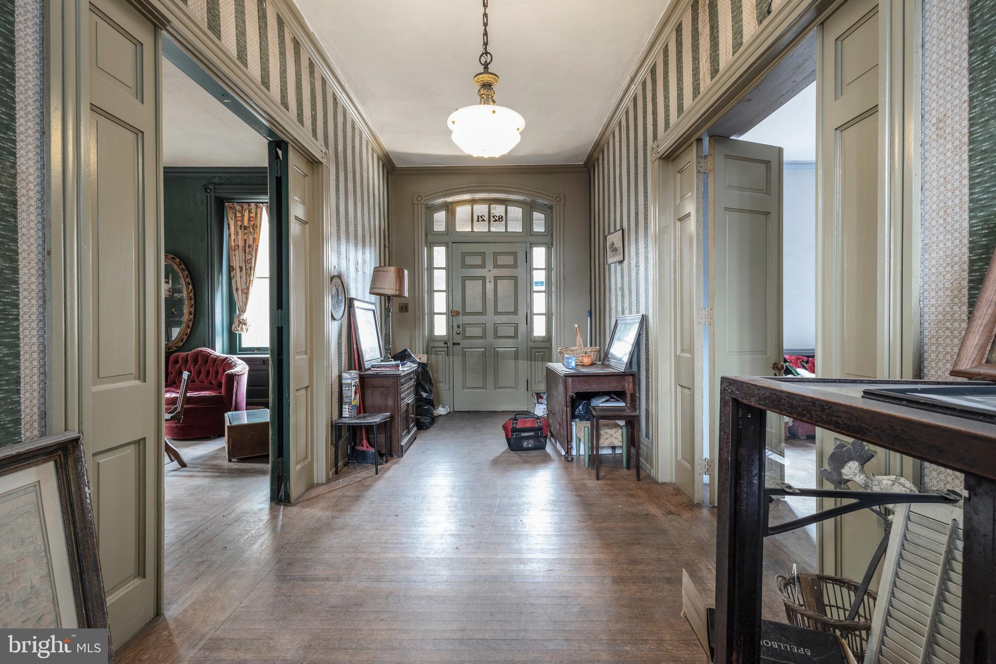 8221 Seminole Street Philadelphia, PA 19118 - Photo 7 of 20 a view of a livingroom with furniture and a window