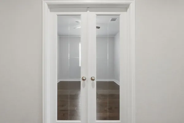 an empty room with windows