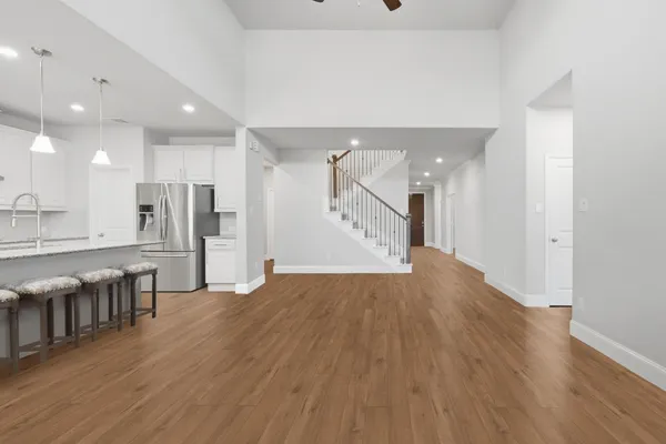 a view of kitchen with window and wooden floor