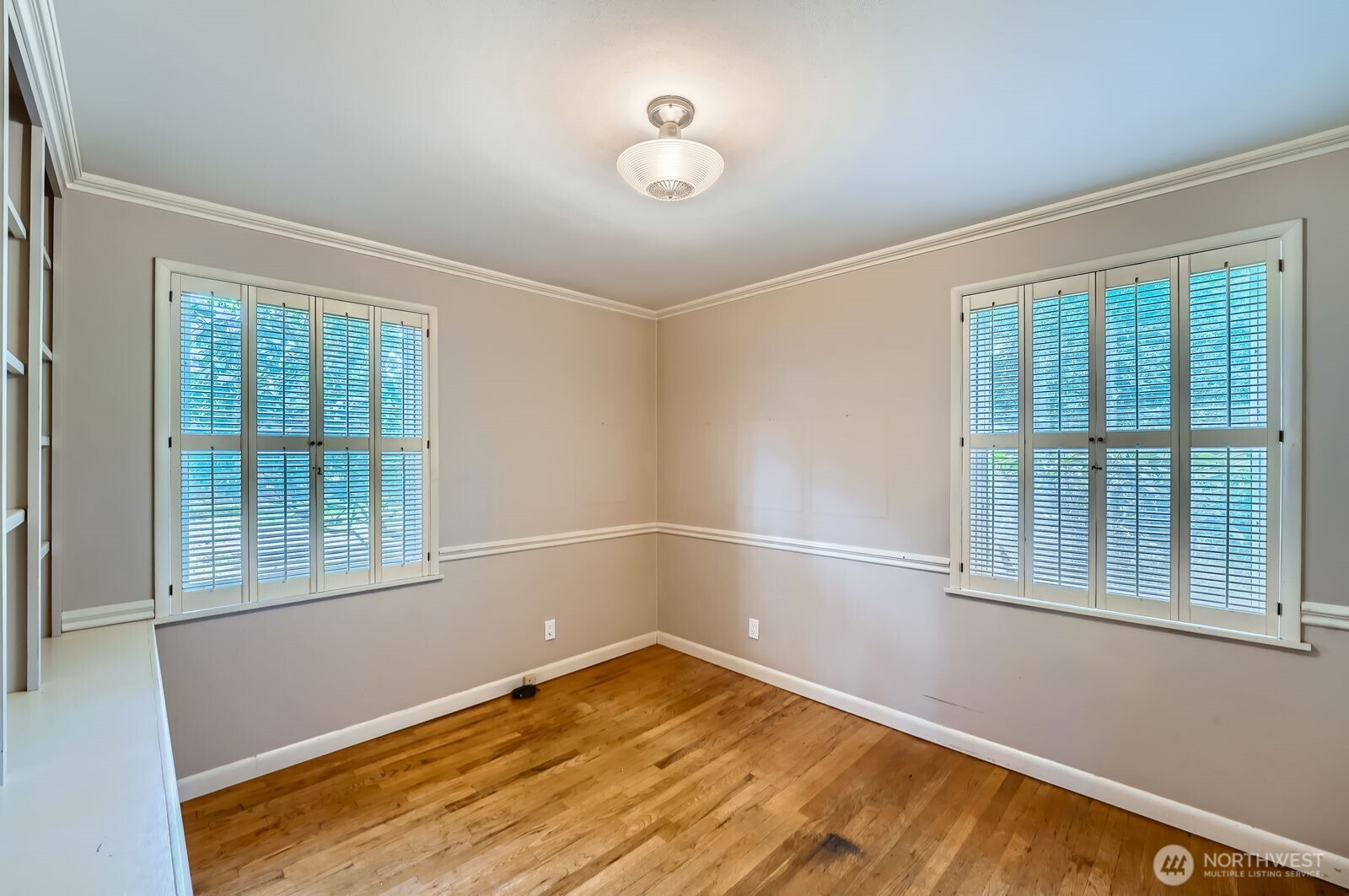 3706 84th Avenue Southeast Mercer Island, WA 98040 - Photo 16 of 38 wooden floor in an empty room with a window