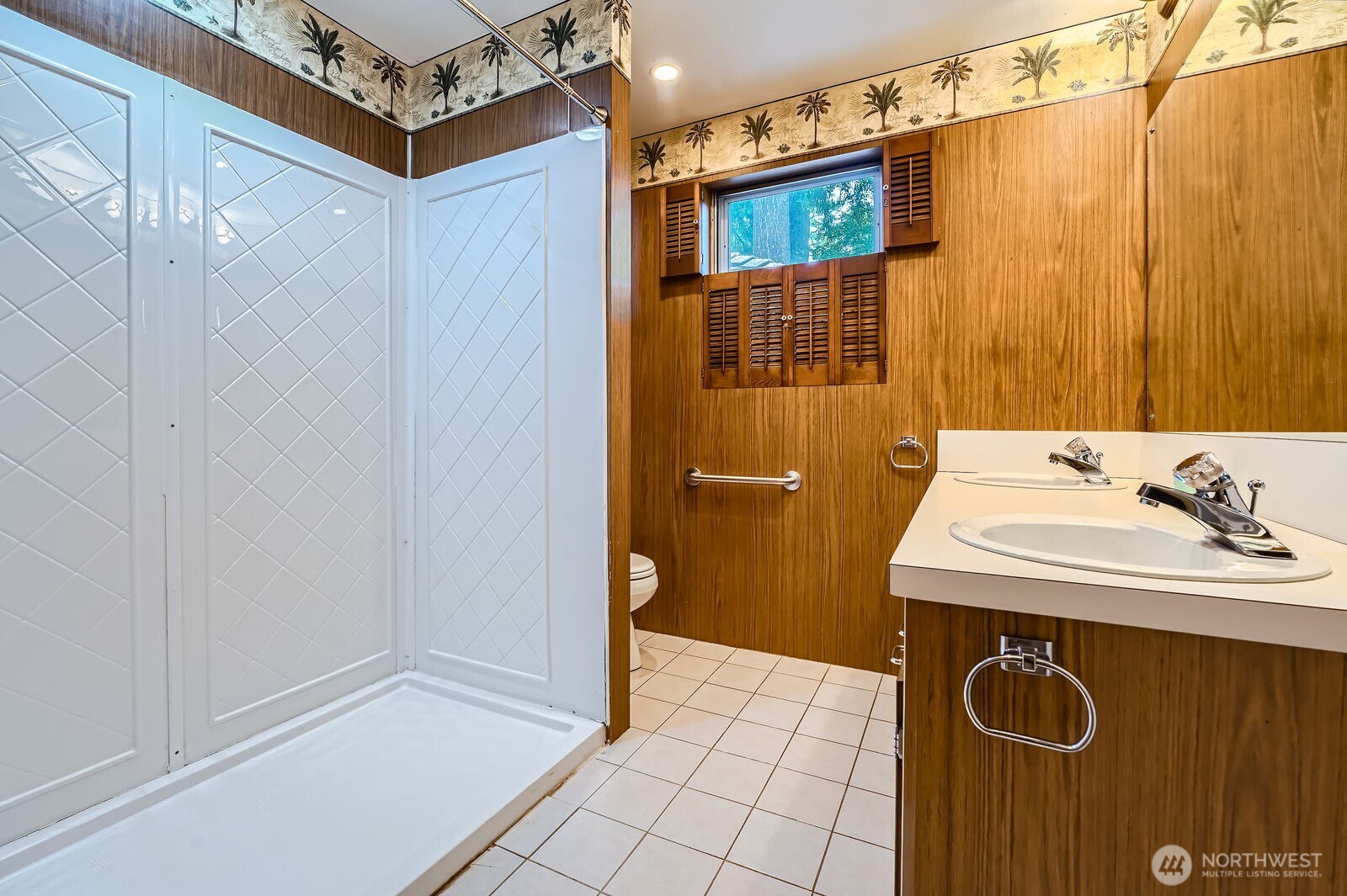 3706 84th Avenue Southeast Mercer Island, WA 98040 - Photo 20 of 38 a bathroom with a sink and a mirror