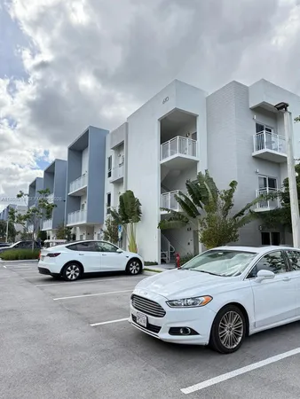 a car parked in front of a house