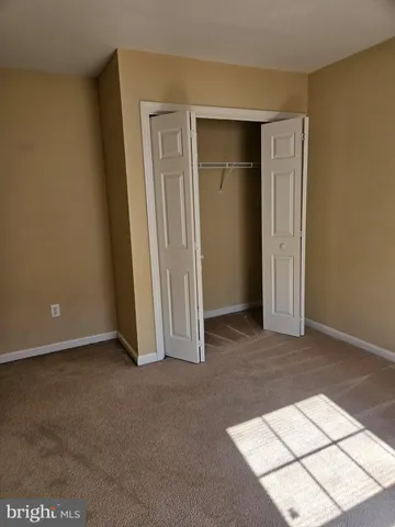 an empty room with closet