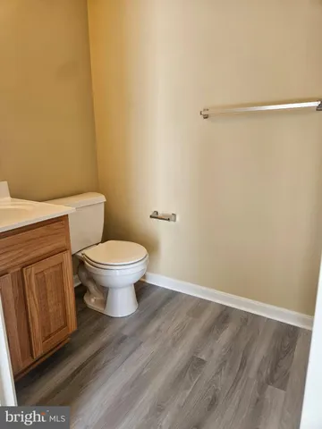 a bathroom with a toilet and a sink