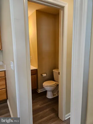 a bathroom with a toilet and a sink