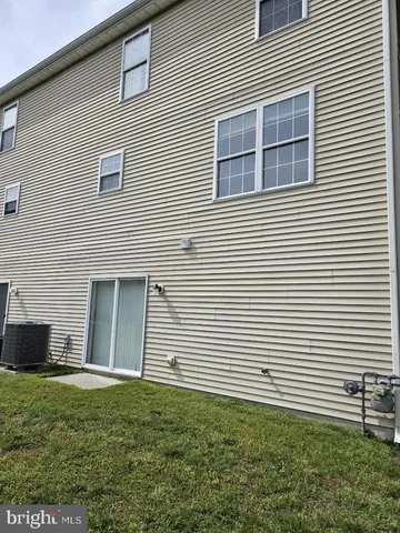 a house view with a backyard space
